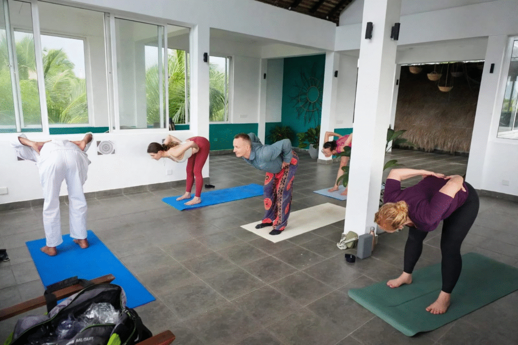 Students practising during yoga teacher training in Sri Lanka at Green Serene Villa, Galle