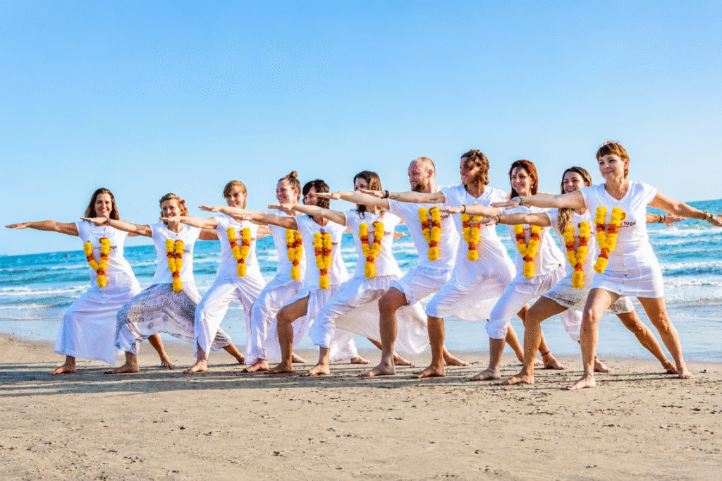 Yoga students lighting Diwali diyas at Diksha Yoga School in Arambol, Goa
