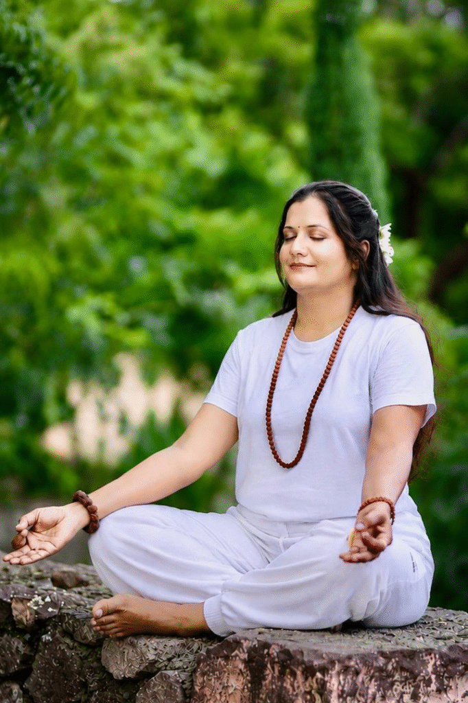 Founder Yogini Manisha of Diksha Yoga School guiding students through traditional yoga practices and meditation.